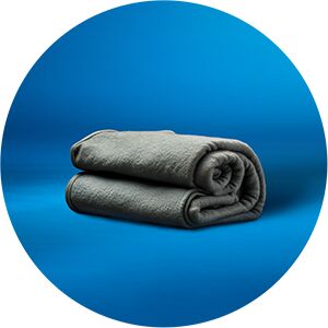 Kuva harmaasta viltistä. 