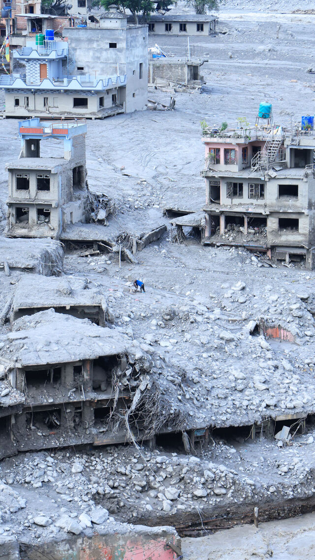 Tulvassa kärsineitä rakennuksia Nuwakotin alueella Bagmatin maakunnassa Nepalissa 27. elokuuta.
